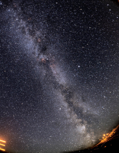 Wide-angle pan of Milky Way from Sagittarius setting to Cassiopeia over in the northern sky rising. 