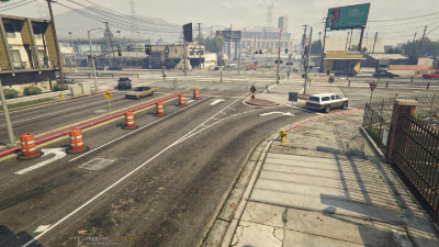 Made sense out of an intersection that makes no sense, by adding barriers (can't turn left)