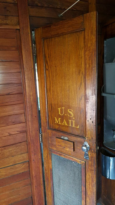 The door, with letter slot, leading from the passenger section of the car to the RPO.
