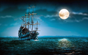 Ship at sea in moonlight