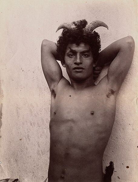 Gloeden, Wilhelm von (1856 1931) n. 1240. A Sicilian boy, posing as Pan wearing horns, Wellcome imag